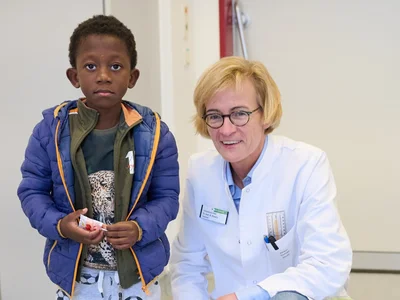 Kiame und Dr. Katrin Rosery
